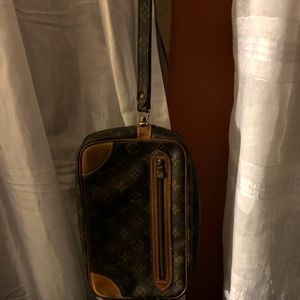 Louis Vuitton Large wristlet 10 3/8 ln 6in Height